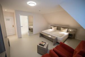 מיטה או מיטות בחדר ב-Altes Landhaus