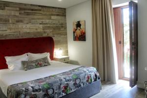 Letto o letti in una camera di Art'Otel Barcelos
