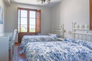 Katil atau katil-katil dalam bilik di La Quimera