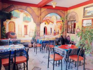 Restaurant ou autre lieu de restauration dans l'établissement Estrella del Lago