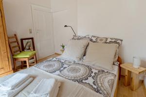 Postel nebo postele na pokoji v ubytování An der Gose - Gästezimmer & Appartement