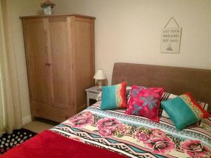 A bed or beds in a room at The Studio 