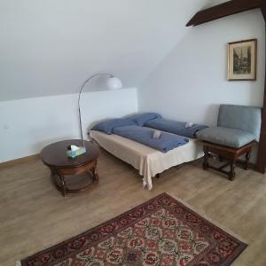 Кровать или кровати в номере Atelier Apartment with Traunsee Lake view