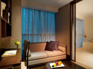 Postel nebo postele na pokoji v ubytování Himalayas Hotel Shanghai