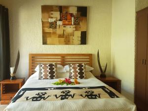 Voodi või voodid majutusasutuse Paradise Cove Resort toas