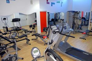 a gym with a bunch of exercise bikes in it at Best Western Hotel Nettuno in Brindisi