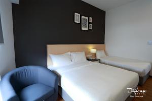 Postel nebo postele na pokoji v ubytování De House Hotel