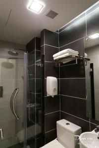 Koupelna v ubytování De House Hotel