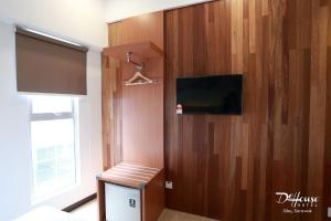 TV a/nebo společenská místnost v ubytování De House Hotel