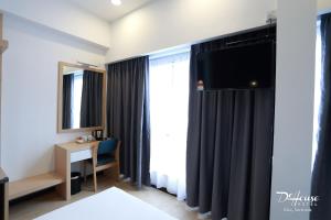 Postel nebo postele na pokoji v ubytování De House Hotel