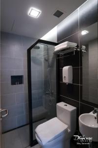 Koupelna v ubytování De House Hotel