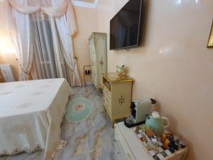 TV a/nebo společenská místnost v ubytování FD Luxury rooms