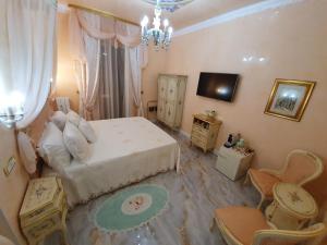 Postel nebo postele na pokoji v ubytování FD Luxury rooms