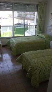 Cama o camas de una habitación en Edificio Estrella de mar