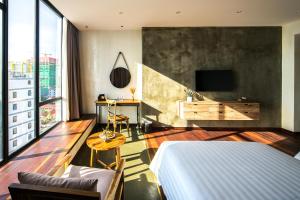 Postel nebo postele na pokoji v ubytování SIM Boutique Hotel + 37 fotografií