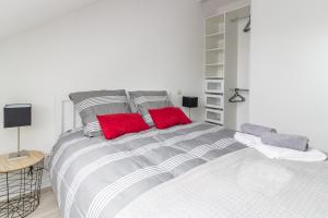 מיטה או מיטות בחדר ב-Gîte Club House 2 & 3 Gîte CARQUEFOU Centre