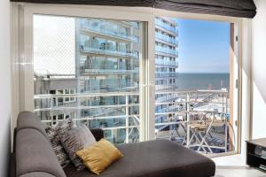 Ruang duduk di Lumina Suite Seaview & Garage