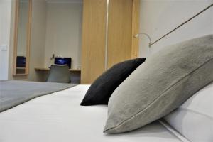 Postel nebo postele na pokoji v ubytování Apartamentos La Playina