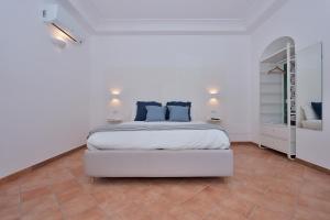Postel nebo postele na pokoji v ubytování Casa Amorino