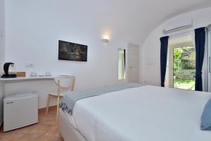 Postel nebo postele na pokoji v ubytování Casa Amorino