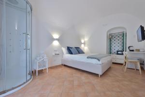 Postel nebo postele na pokoji v ubytování Casa Amorino