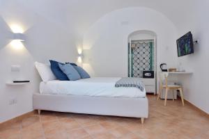 Postel nebo postele na pokoji v ubytování Casa Amorino