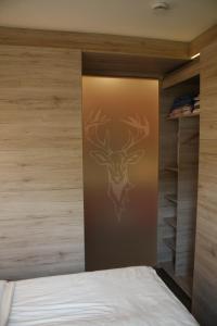 Postel nebo postele na pokoji v ubytování Design-Appartement Jochberg
