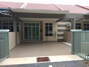 a house with a gate in front of it at Z&M homestay in Jertih
