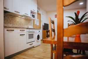 
Una cocina o zona de cocina en Apartamentos Ducay
