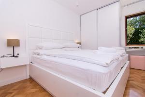 מיטה או מיטות בחדר ב-Villa Stina