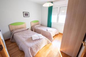 Posteľ alebo postele v izbe v ubytovaní Villa frente al Mar