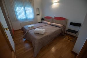 Posteľ alebo postele v izbe v ubytovaní Villa frente al Mar
