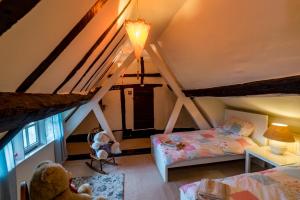 Postel nebo postele na pokoji v ubytování Yew Tree Cottage