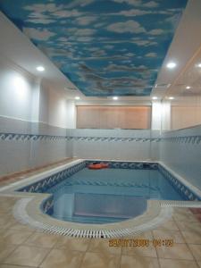 Πισίνα στο ή κοντά στο Golden House Dammam