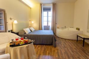 Posteľ alebo postele v izbe v ubytovaní Grand Hotel Impero - Wellness & Exclusive SPA