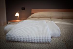 Postel nebo postele na pokoji v ubytování Mauro Home Bed and Relax