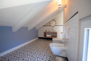 Vannituba majutusasutuses Sui Generis Tropea Luxury Rooms