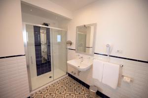 Vannituba majutusasutuses Sui Generis Tropea Luxury Rooms