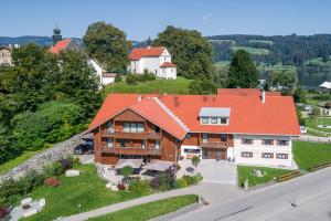 an aerial view of a house with a red roof at Hierlhof in Immenstadt im Allgäu