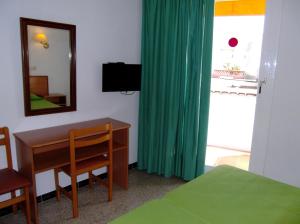 TV a/nebo společenská místnost v ubytování Hotel Simeon