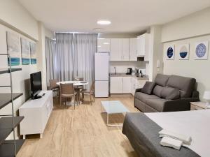 Kuchyňa alebo kuchynka v ubytovaní Guajara Modern Studio