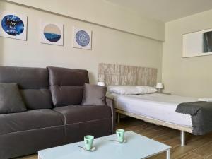 Posteľ alebo postele v izbe v ubytovaní Guajara Modern Studio