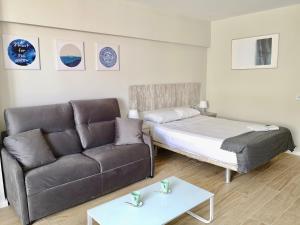 Posteľ alebo postele v izbe v ubytovaní Guajara Modern Studio