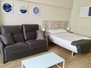 Posteľ alebo postele v izbe v ubytovaní Guajara Modern Studio