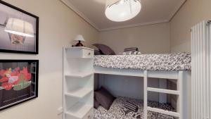 A bed or beds in a room at Pozo by clabao