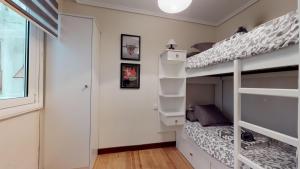 A bed or beds in a room at Pozo by clabao