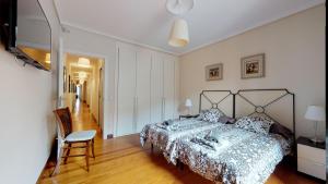 A bed or beds in a room at Pozo by clabao Még 12 kép