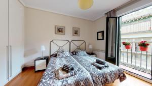 A bed or beds in a room at Pozo by clabao