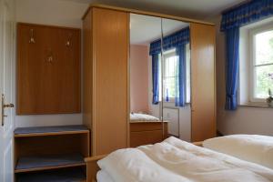 Postel nebo postele na pokoji v ubytování 2-Zimmer Deluxe Apartment Bad Füssing - Owner Suite