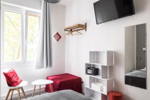 Televízia a/alebo spoločenská miestnosť v ubytovaní Interno 7 - Rooms da Vale